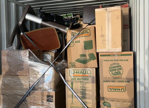Donated medical furniture and equipment loaded into a shipping container